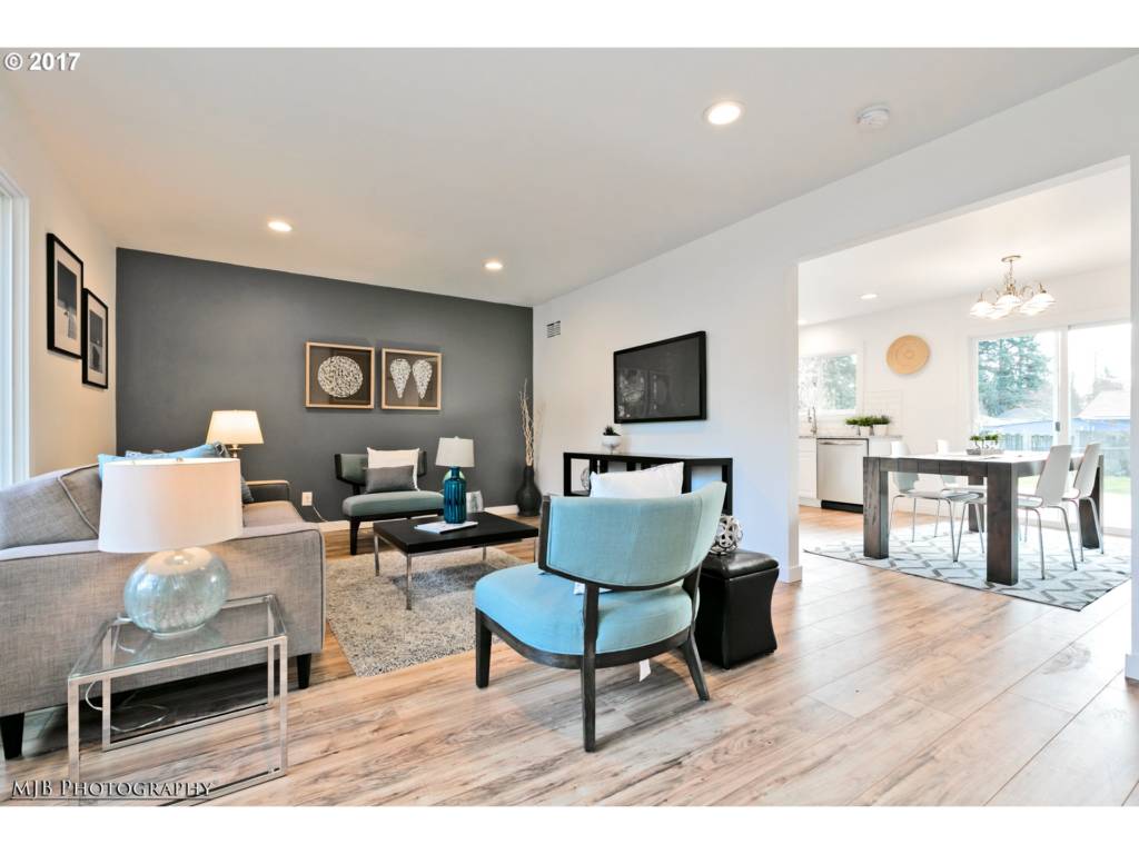 living room and kitchen view of charming Mill Park home 