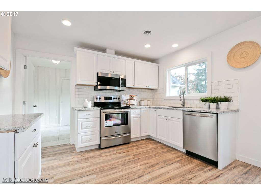 newly renovated kitchen with stainless steel appliances